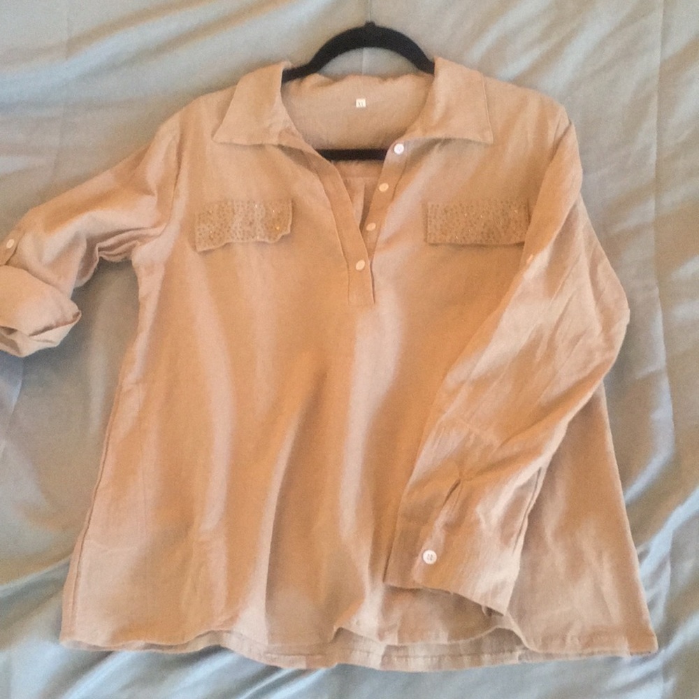 Beige long sleeve top with embellished pockets